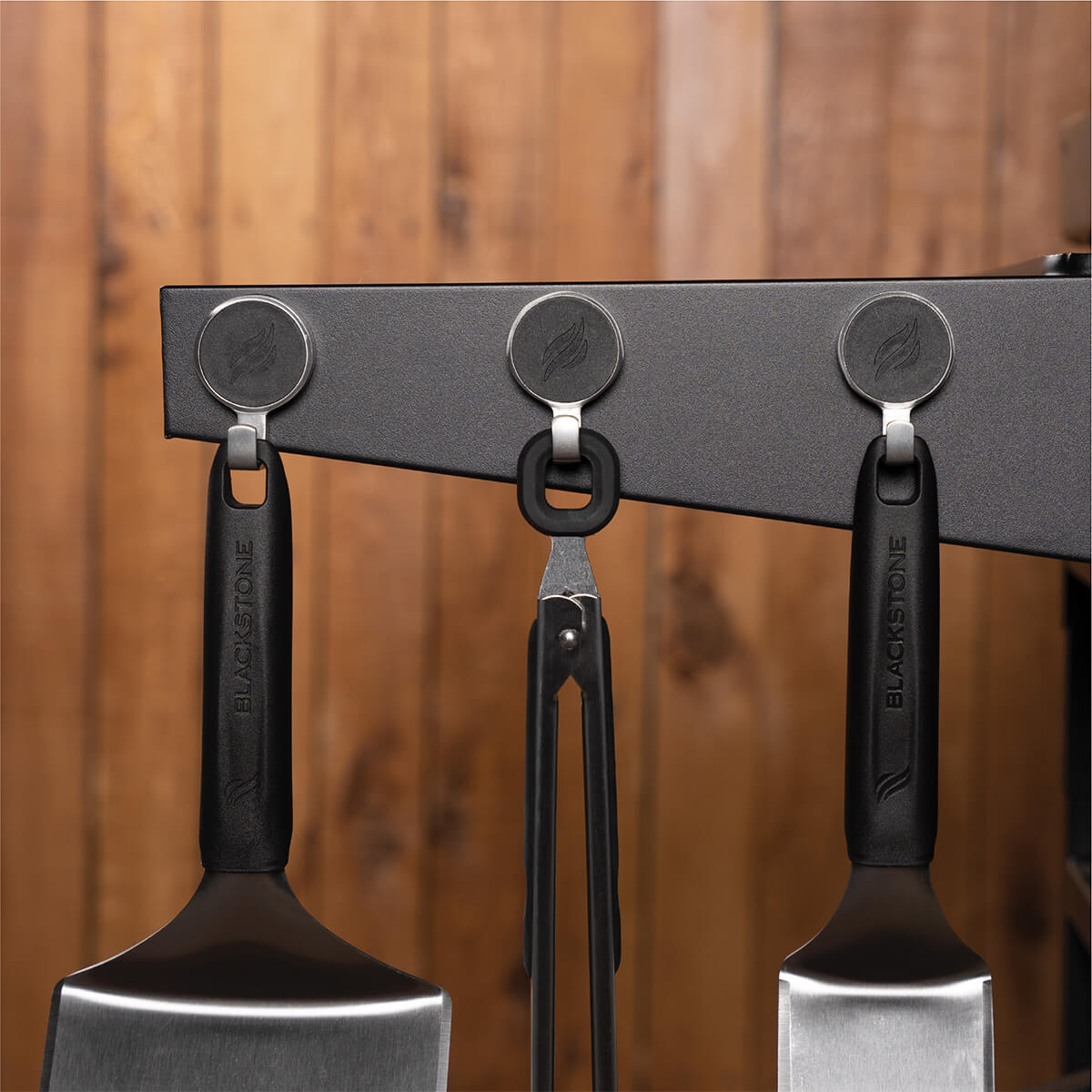 Porte-outils et trappe à graisse