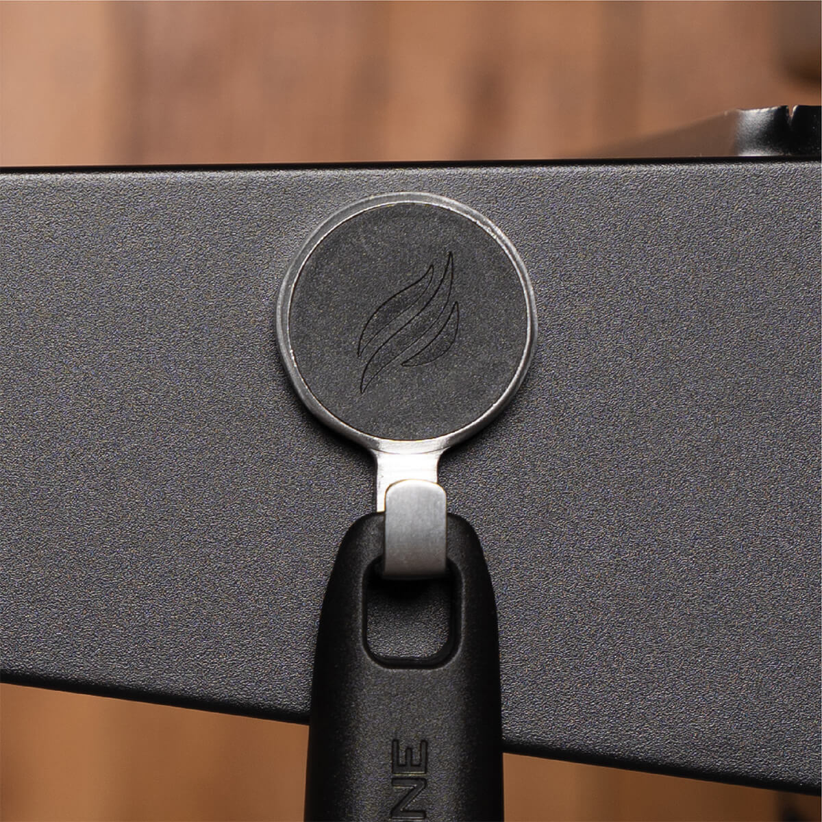 Porte-outils et trappe à graisse