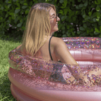 Piscine gonflable or rose pour bronzer