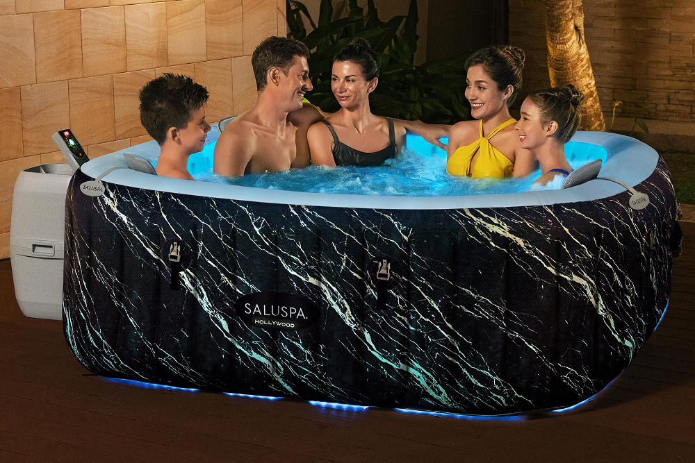 Family enjoying inflatable hot tub